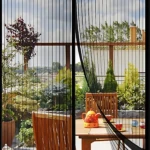 Cortina magnética de malla negra para puerta, 1.8mts, ideal para patios y balcones.