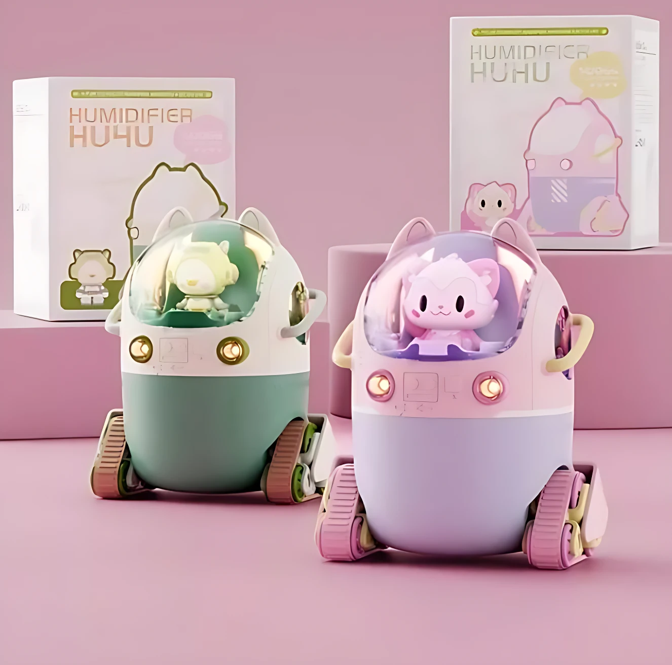 Difusor de humedad USB con diseño de robot tanque y orugas. Dos unidades: una verde menta y otra lila, con personajes en cúpula transparente y luces LED frontales.