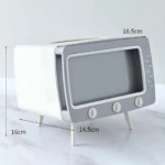 Dispensador de servilletas blanco y gris con forma de TV antigua, 18.5cm ancho, 16cm alto, 14.5cm profundidad.