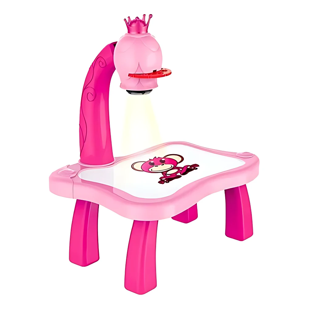 Escritorio rosa con proyector en forma de corona, ideal para niños. Muestra de personaje en superficie blanca.