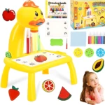 Escritorio amarillo con forma de pato, incluye marcadores, libro de dibujo, pegatinas de frutas y accesorios para colorear.