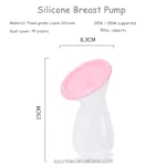 Extractor de leche manual en silicona rosa y blanco, con tapa protectora de plástico. Mide 15 cm de altura y 8,3 cm de diámetro. Capacidad de 90 ml.
