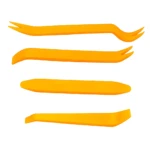 Cuatro herramientas plásticas amarillas para autos, con formas variadas para extraer molduras y paneles sin rayar.