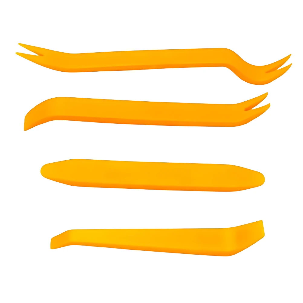 Cuatro herramientas plásticas amarillas para autos, con formas variadas para extraer molduras y paneles sin rayar.