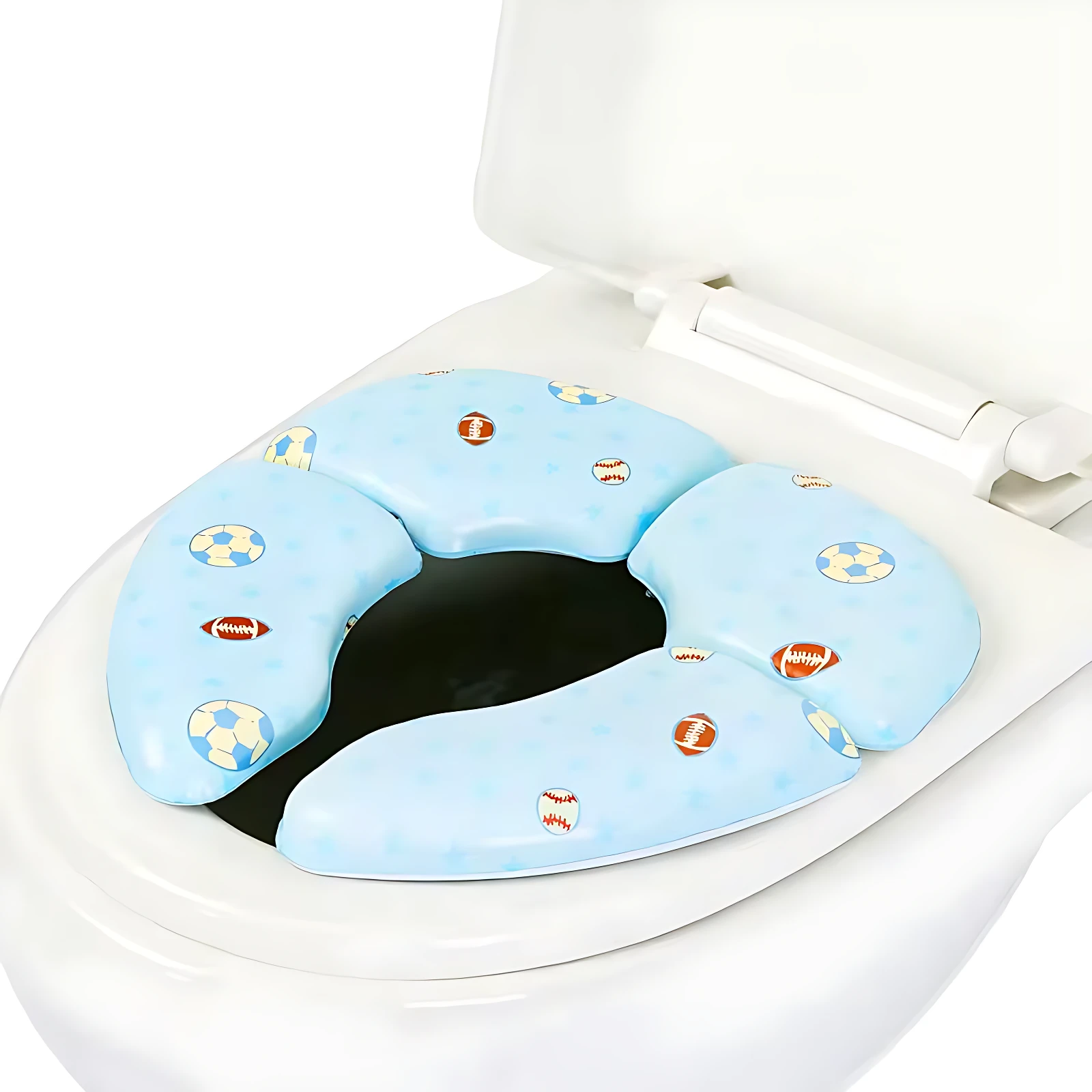 Reductor de baño portátil plegable de espuma azul con estampado de pelotas deportivas, instalado sobre inodoro blanco.