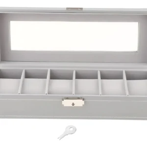 Relojero X6 gris claro con cristal transparente y llave incluida, abierto mostrando seis compartimentos acolchados para almacenamiento seguro.