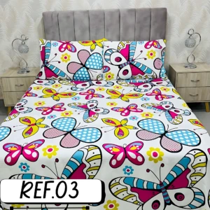 Sábanas dobles blancas con estampado de mariposas y flores en colores vibrantes, textura suave.