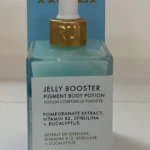 Serum Jelly Booster Truly 90ml, envase de vidrio azul con gotero dorado, ideal para potenciar la pigmentación.