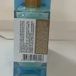 Serum Jelly Booster en frasco de vidrio azul con gotero dorado, 90ml.