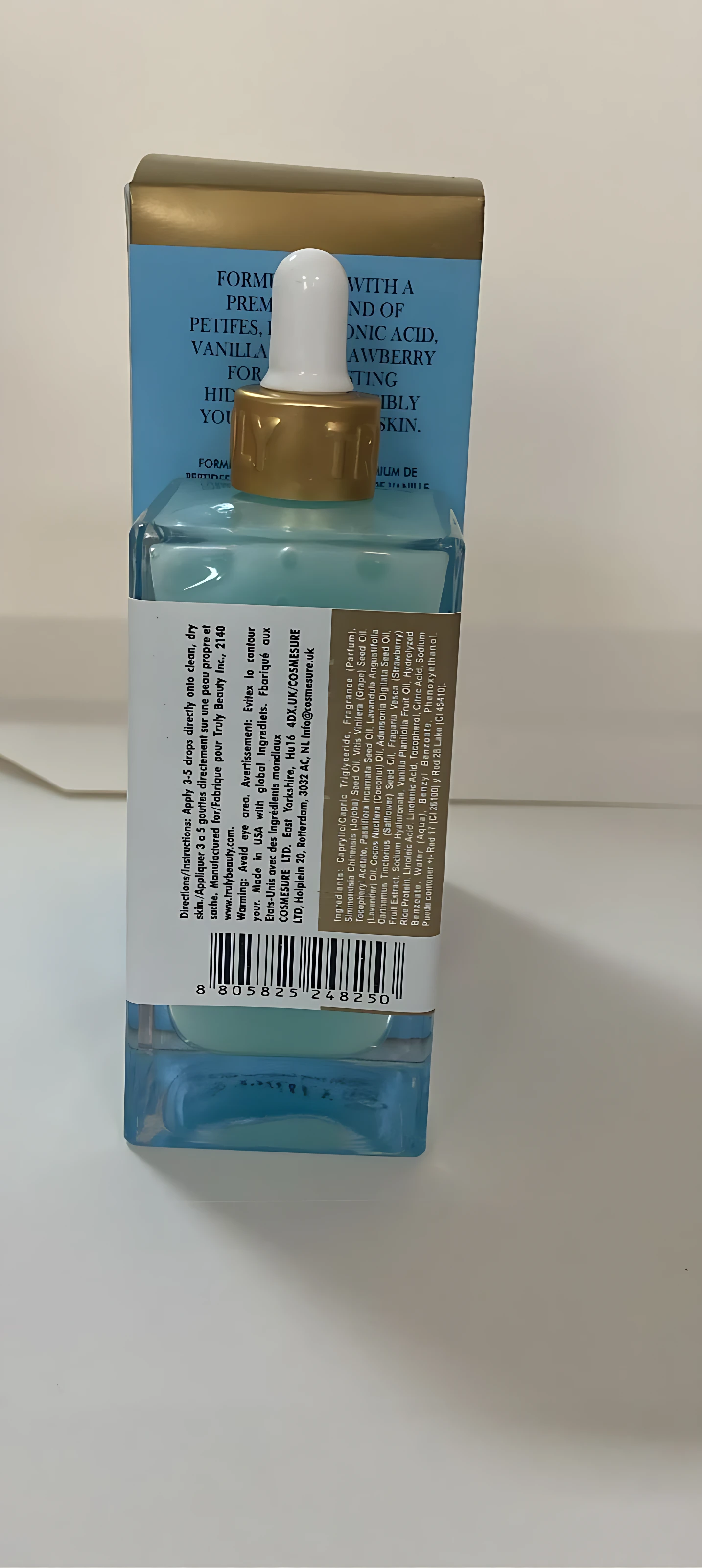 Serum Jelly Booster en frasco de vidrio azul con gotero dorado, 90ml.