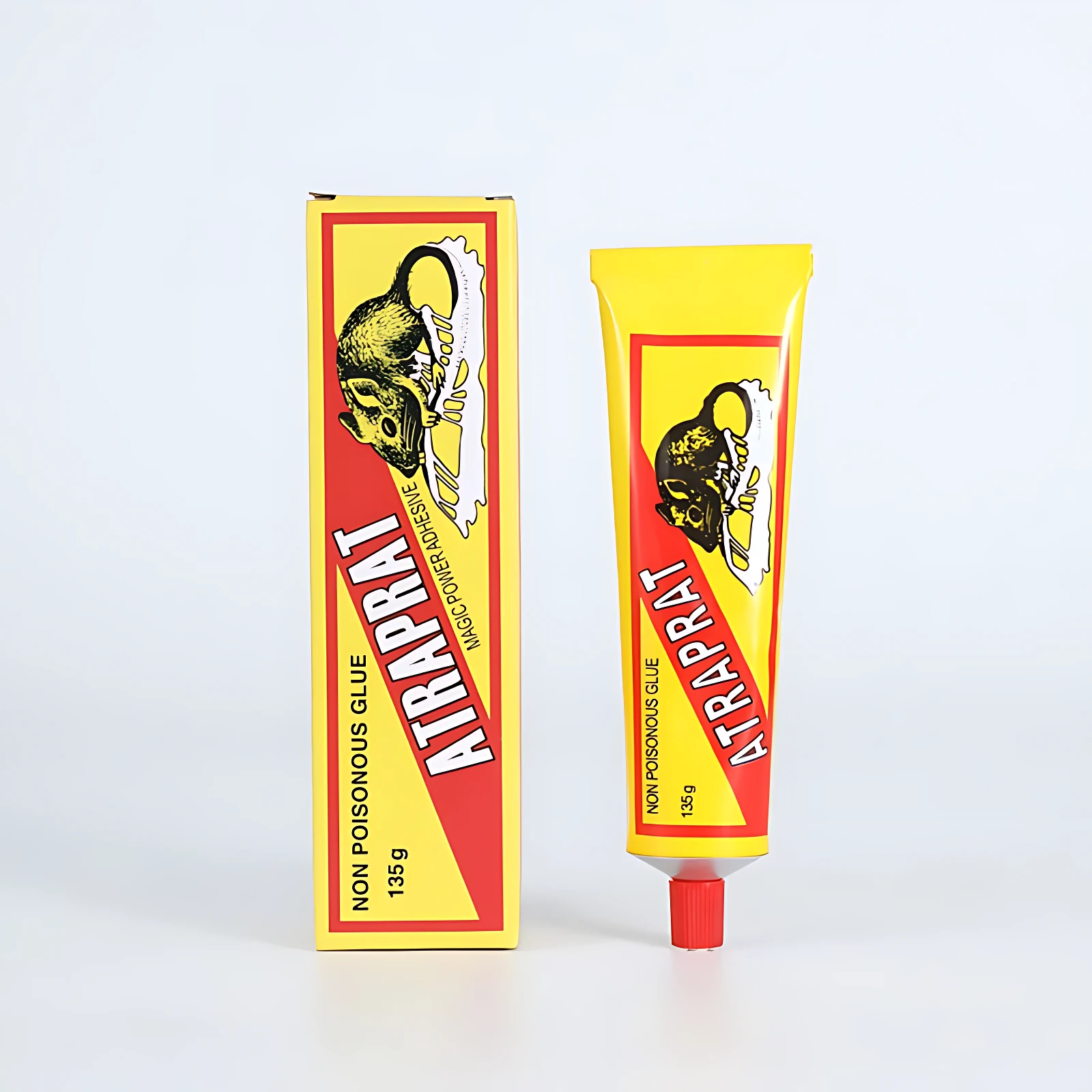 Caja y tubo de pegamento para ratas Atrap Rat, amarillo y rojo, 135g cada uno.