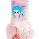 Gorro de baño rosa con estampado de estrellas, mostrando empaque transparente con de modelo usando gorro azul. Incluye dos unidades para proteger cabello y maquillaje durante la ducha.