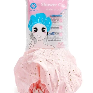Gorro de baño rosa con estampado de estrellas, mostrando empaque transparente con de modelo usando gorro azul. Incluye dos unidades para proteger cabello y maquillaje durante la ducha.