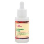 Bote de vidrio blanco con gotero, etiqueta amarilla con detalles multicolores, contiene suero Niacinamida 10% Good Molecules para uniformar tono facial.