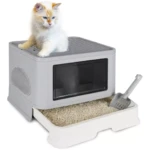 Arenera para gato plegable con tapa y filtro, color gris claro, con gato sentado encima y pala de arena incluida.