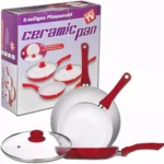 Sartén cerámica antiadherente con mango rojo, junto a su caja que muestra el set completo de cinco piezas. Incluye tapa de vidrio y sartén plana.