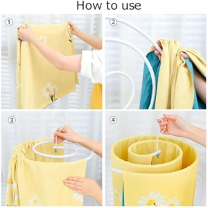 Instrucciones de uso del tendedero espiral amarillo con flores, mostrando cómo colgar sábanas y mantas en perchas blancas para secado sin arrugas.