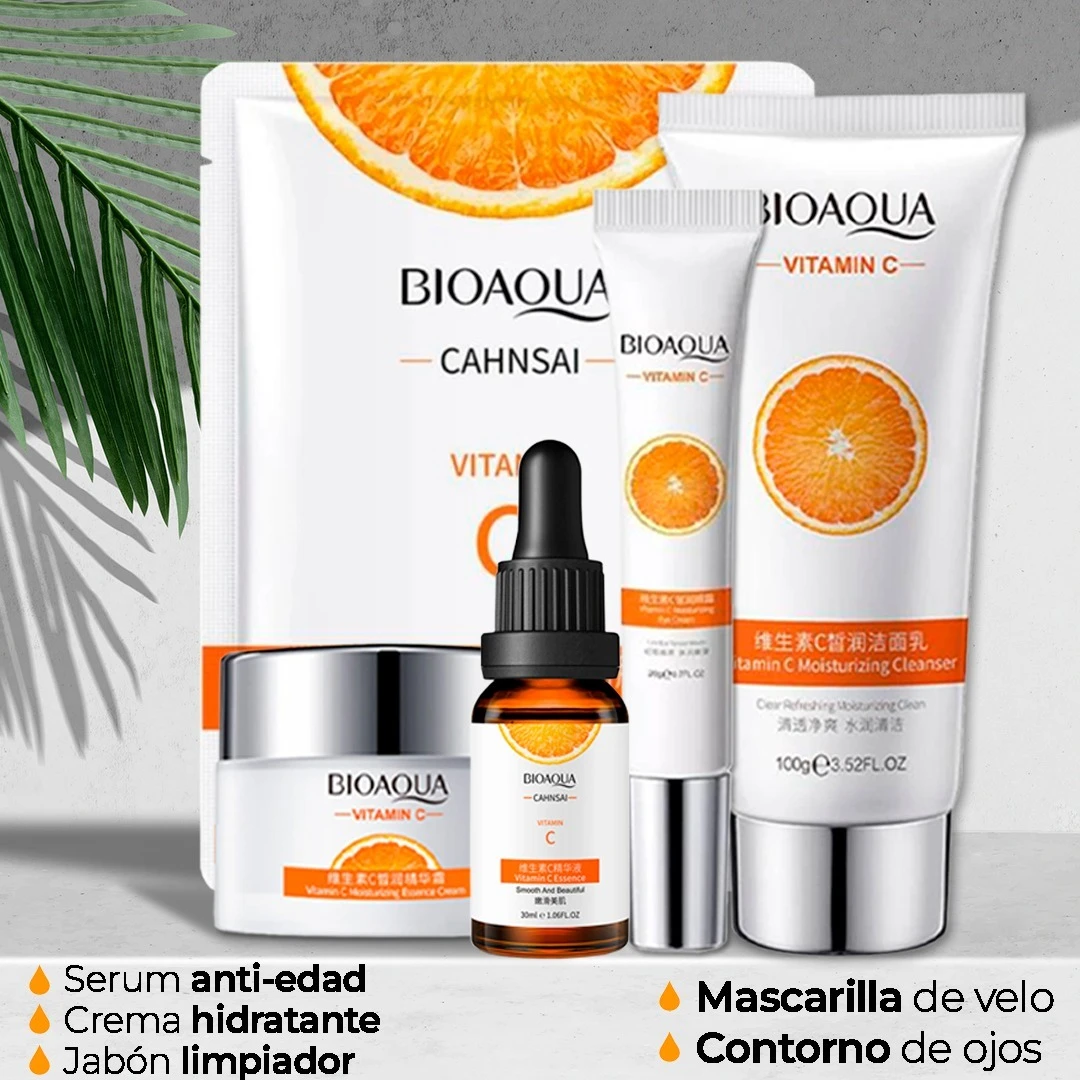 Set de cuidado facial BIOAQUA con serum de vitamina C, parches de ojos, crema hidratante y jabón limpiador, presentados en envases blancos con detalles naranjas.