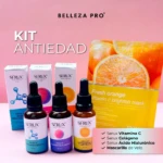 Kit antiedad Serux con tres serums y mascarilla de naranja, fondo rosa claro.