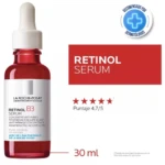 Bote de vidrio rojo con gotero, etiqueta blanca que muestra "Retinol B3 Serum" de La Roche-Posay. Incluye sello de dermatólogos y texto "30 ml".