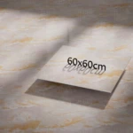 Lámina adhesiva para piso en PVC de 60x60 cm, color beige con vetas doradas, mostrada sobre superficie de piso similar.