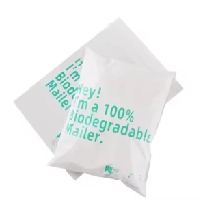 Bolsa de envío biodegradable resistente a la humedad, color blanco con texto en verde que dice "I'm a 100% Biodegradable Mailer".