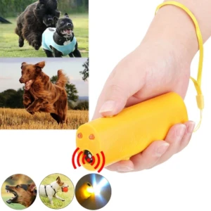 Entrenador canino amarillo con luz y ultrasonido, accionado por pila 9V, diseñado para disuadir ladridos sin contacto físico.