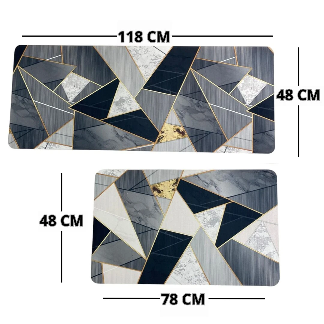 Tapete antideslizante de cocina con diseño geométrico en tonos grises, negros y dorados, disponible en dos tamaños: 118 x 48 cm y 78 x 48 cm.