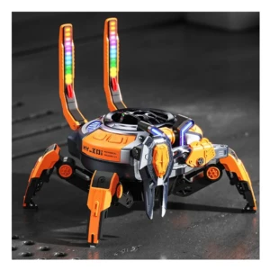 Robo cangrejo parlante Bluetooth naranja con luces LED multicolor y patas articuladas, modelo KY-X01, sobre superficie metálica oscura.