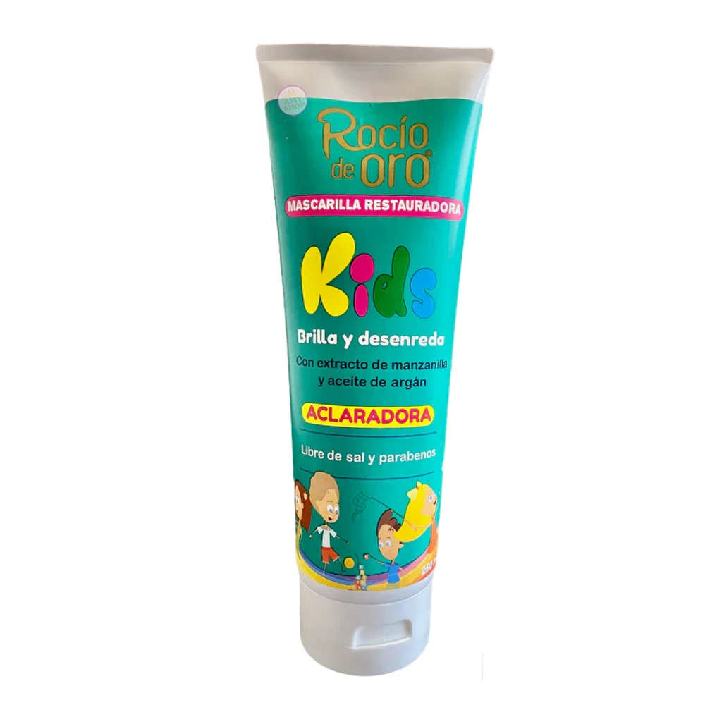 Tubo de mascarilla restauradora Kids de Rocío de Oro, color turquesa con letras multicolores. Contiene manzanilla y argán, libre de sal y parabenos. Presentación para cabello rubio de niños.