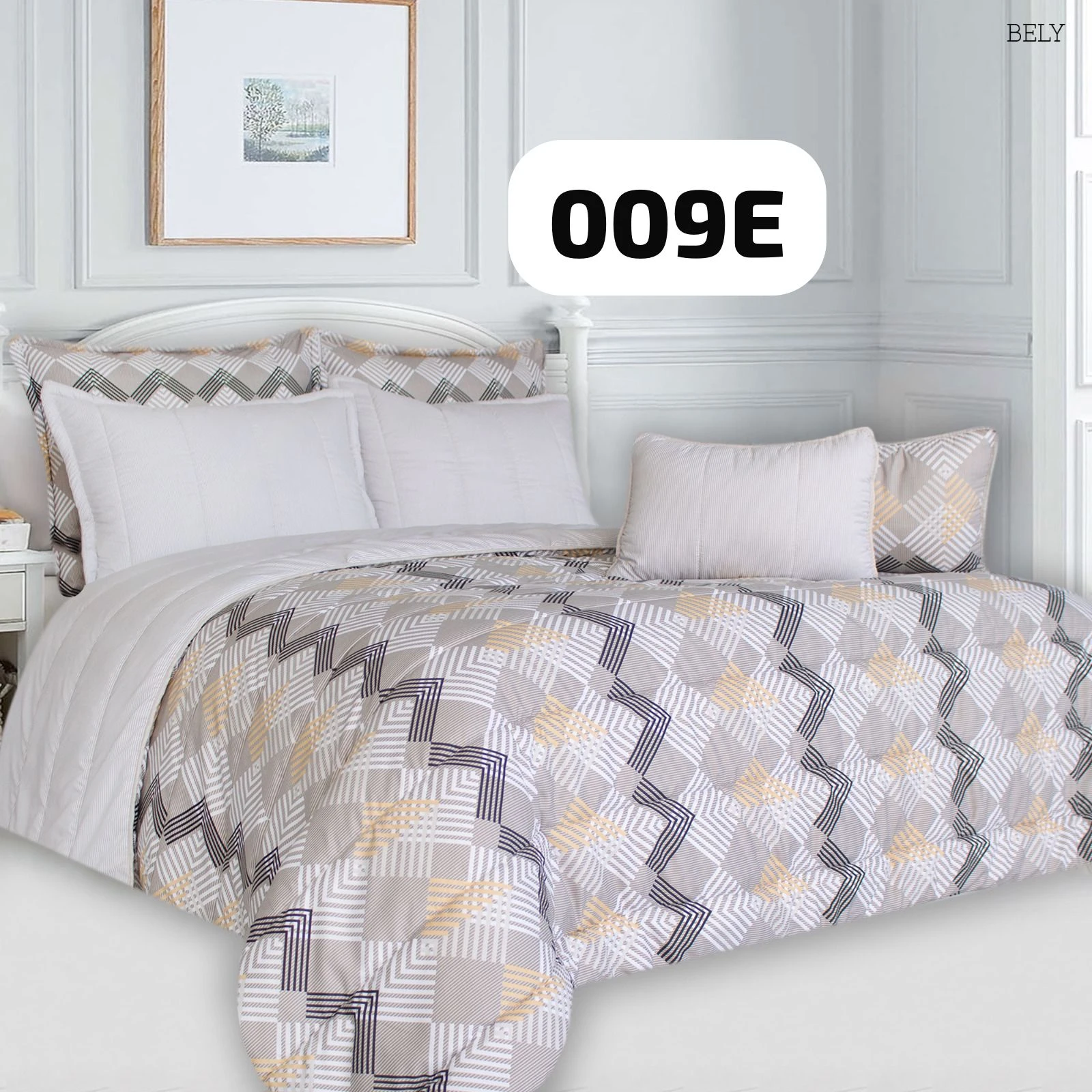 Plumón con estampado geométrico en tonos beige, gris y blanco, sobre cama con cabecero blanco y cojines combinados.