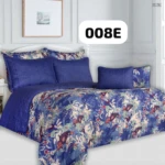 Plumón floral azul con cojines combinados, diseño elegante para cama doble, ideal para renovar tu descanso con confort inmediato.