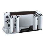 Base de carga para Nintendo Switch OLED en blanco, con cuatro mandos Joy-Con insertados y luces LED rojas visibles.
