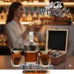 Set de whisky con decantador de vidrio, dos copas de cristal tallado y cofre de madera con piedras de enfriamiento.