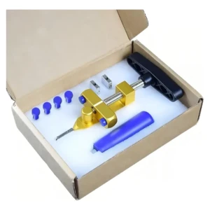 Cortadora de cerámica y vidrio en caja abierta, con alicate triturador dorado, mango azul y accesorios organizados en espuma blanca.