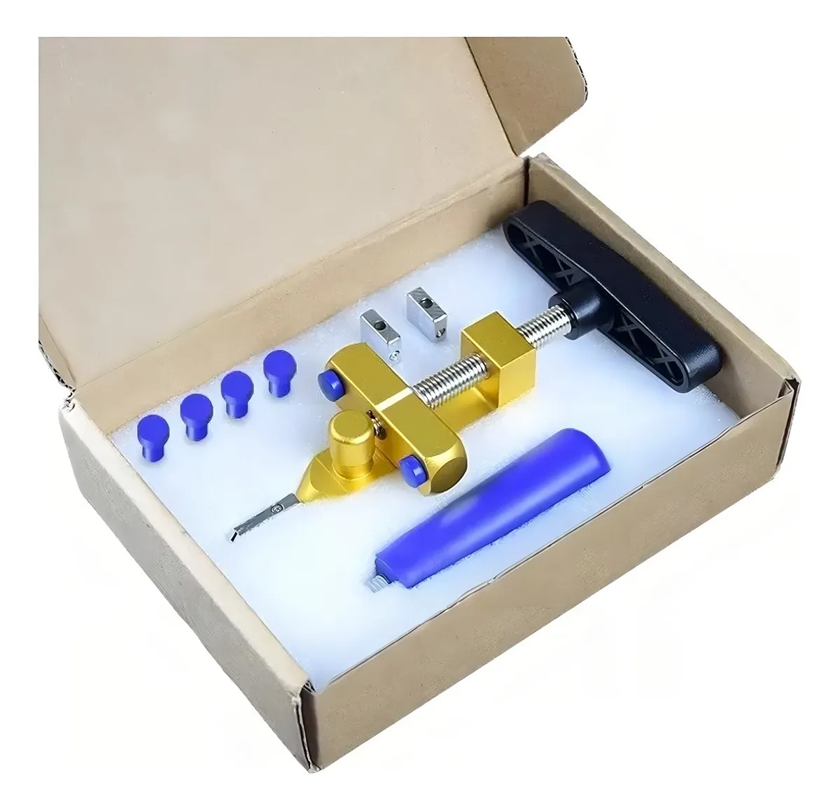Cortadora de cerámica y vidrio en caja abierta, con alicate triturador dorado, mango azul y accesorios organizados en espuma blanca.