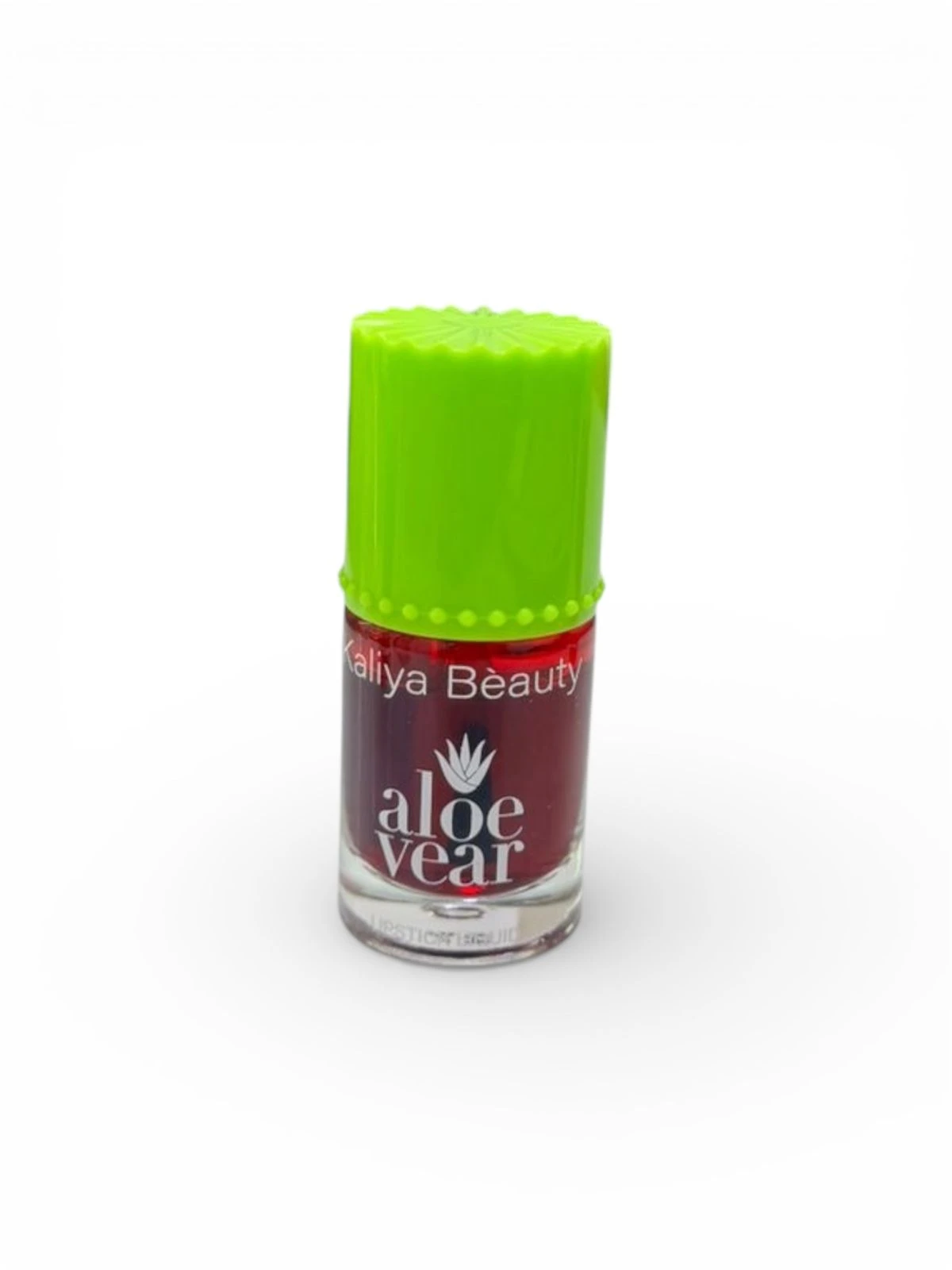 Vaso de vidrio con tapa verde lima, etiqueta roja que muestra "Aloe Vera" y "Kaliya Beauty", producto de cuidado labial.