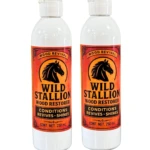 Dos botellas blancas de 250 mL de restaurador de madera Wild Stallion, con etiquetas naranjas y negro que muestran un caballo y texto en inglés.