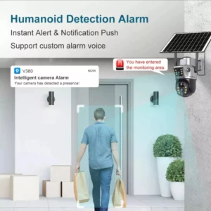 Cámara solar PTZ Full HD con doble lente, montada en pared exterior, detectando a una persona que entra al área vigilada con notificaciones en pantalla.