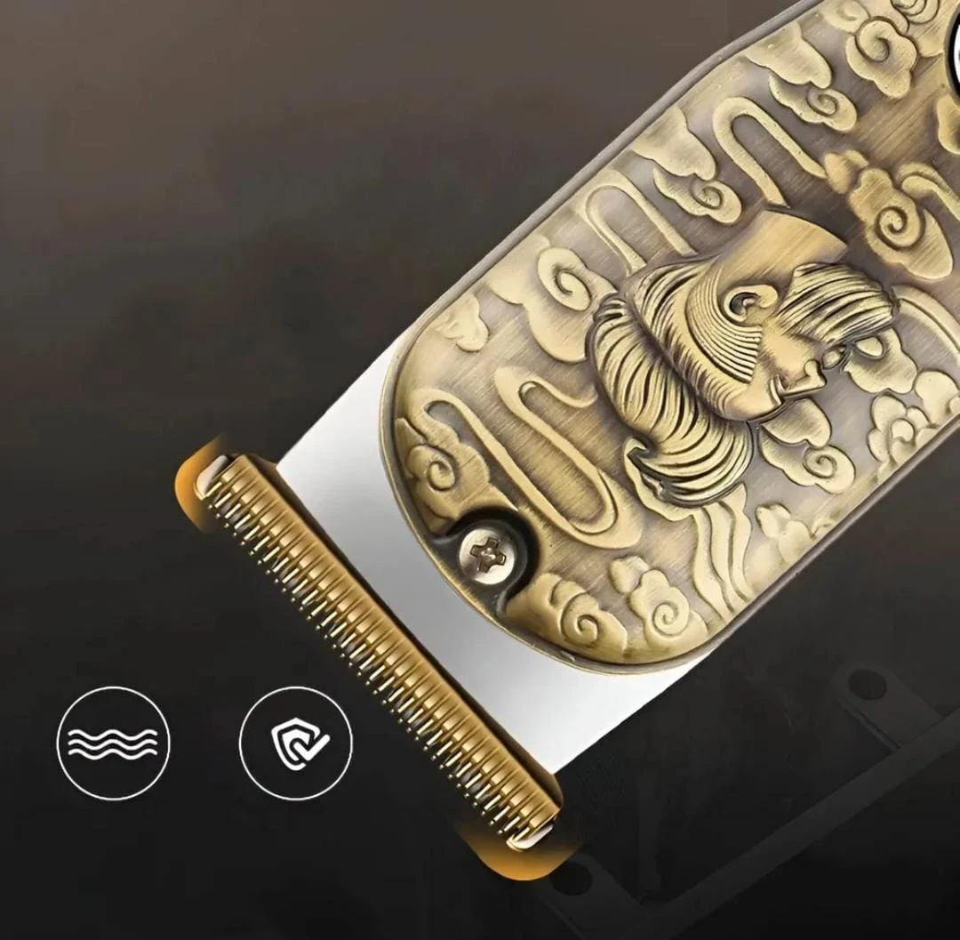 Cortadora de cabello WAER 2936 con detalles en relieve dorado y recubrimiento metálico, mostrando cabezal de corte y botón de encendido.