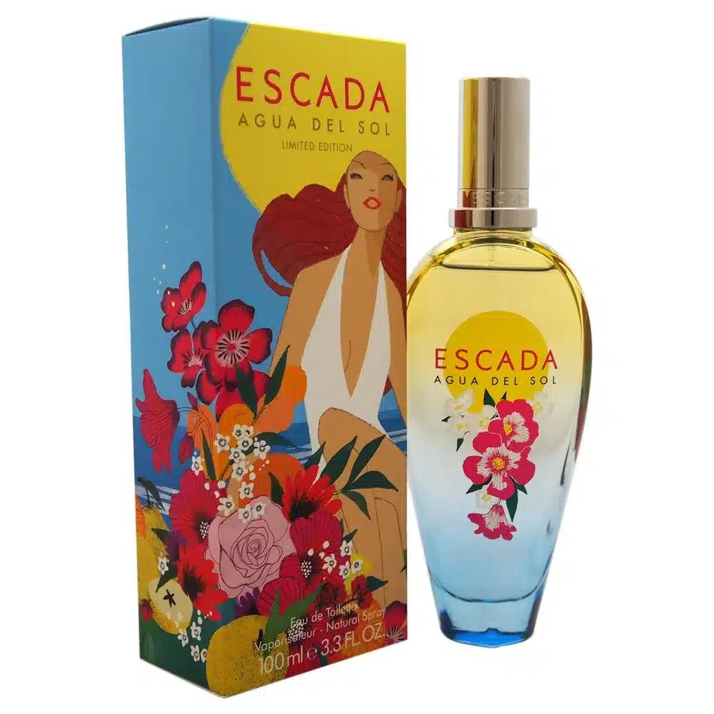 Perfume Escada Agua del Sol, 100 ml. Botella de vidrio con líquido amarillo y tapa metálica. Caja con de mujer en traje de baño rodeada de flores tropicales. Edición limitada.