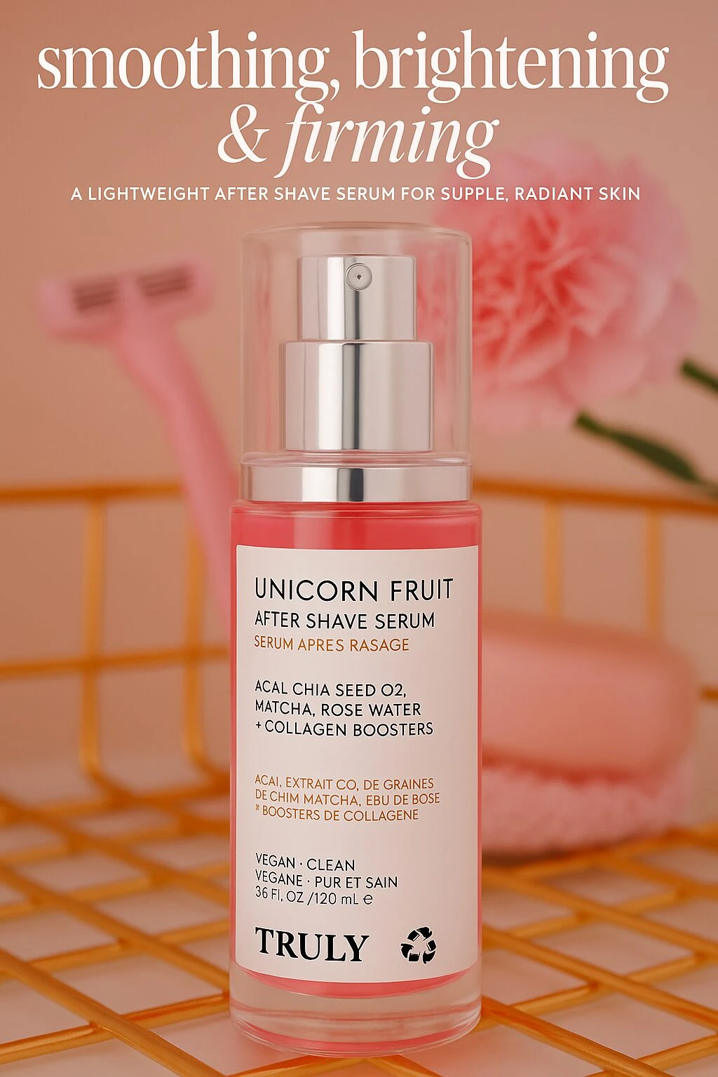 Serum Truly Unicorn Fruit de 120 ml en envase transparente con bomba, sobre fondo rosa con toalla y afeitadora al fondo.