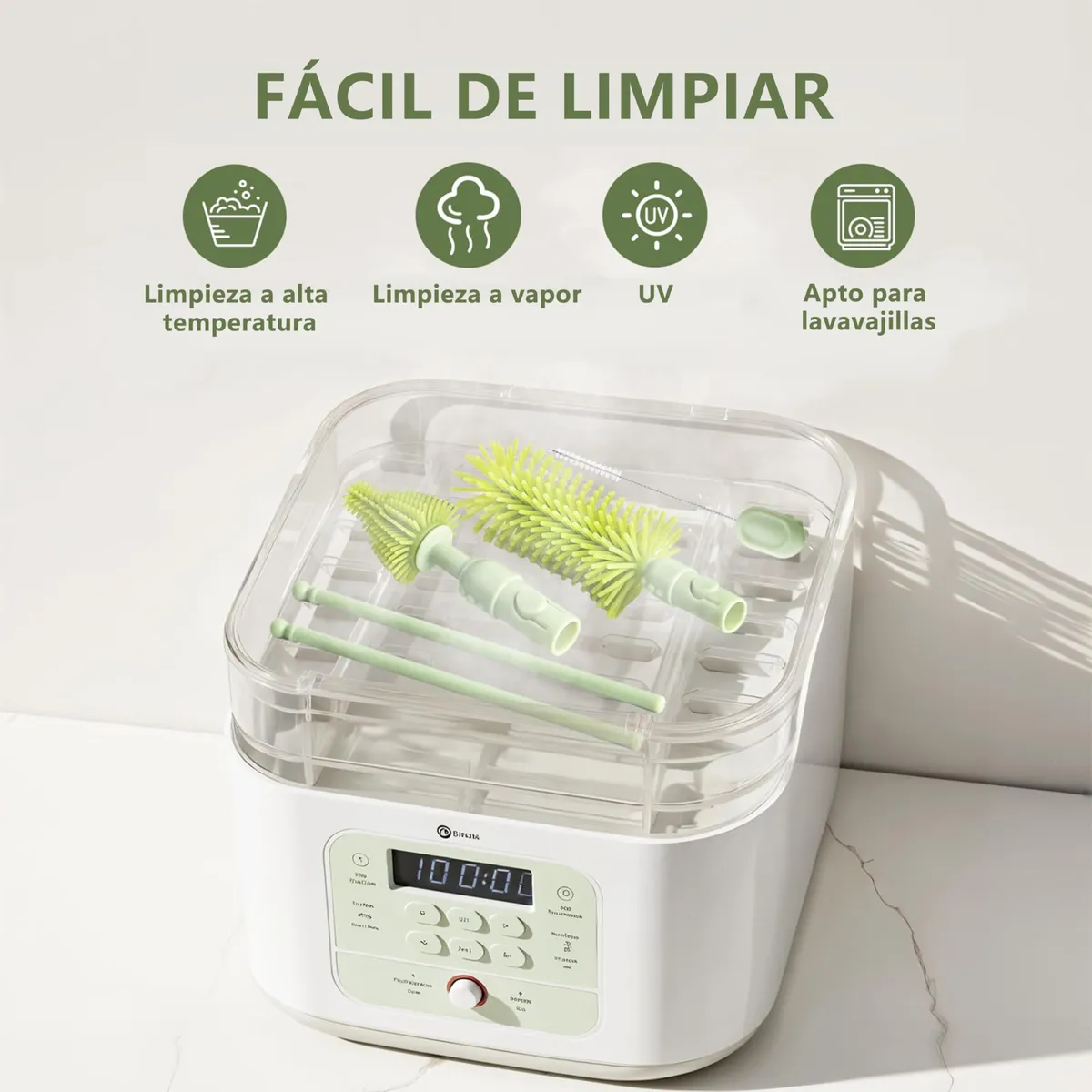 Dispositivo de limpieza portátil para biberones en blanco con detalles en verde claro, mostrando cepillos de silicona y accesorios dentro de su estuche transparente. Panel frontal con pantalla digital y controles táctiles.