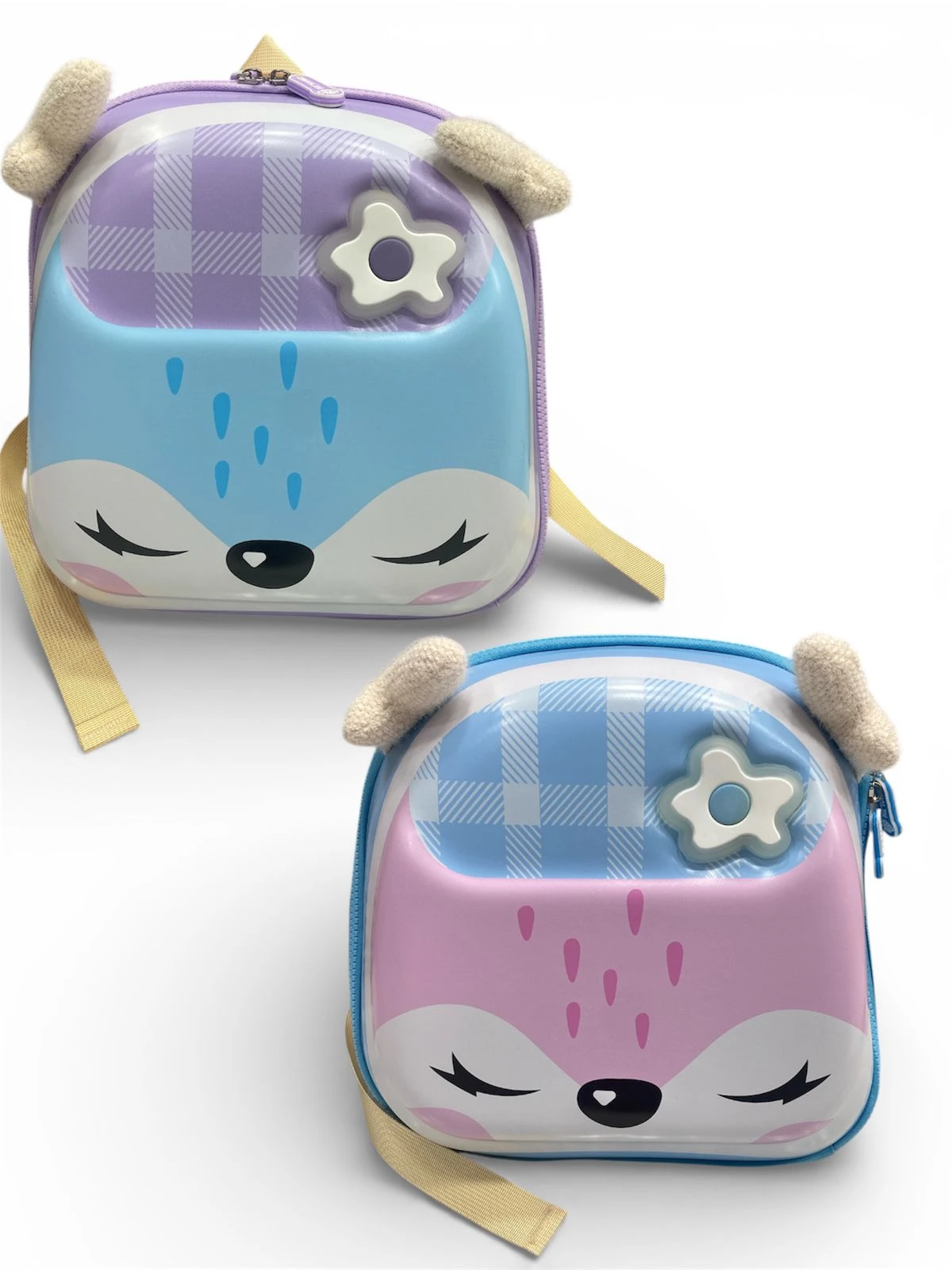 Mochila escolar infantil con diseño de zorro en relieve, disponible en tonos azul y rosa, con orejas y detalles florales.
