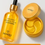 Kit dorado BioAqua con esencia de 24K gold y parches faciales en presentación circular amarilla, ideal para hidratación profunda y luminosidad.