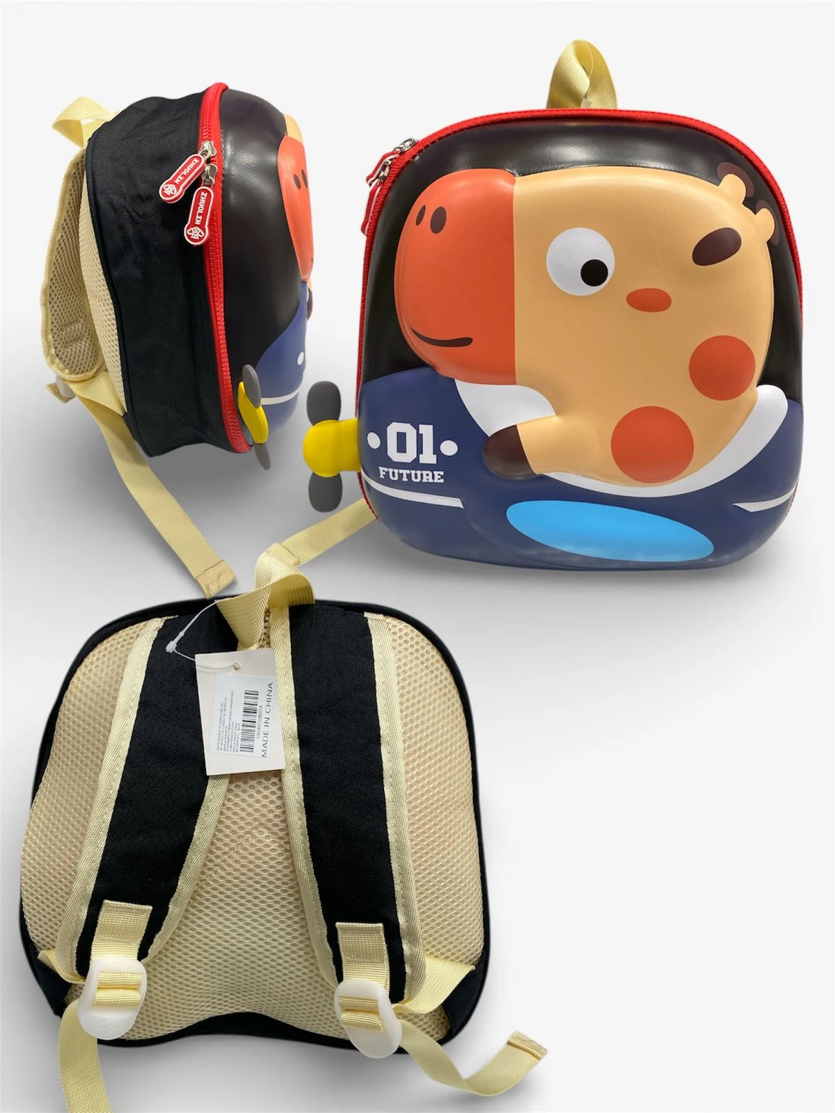Mochila infantil rígida con diseño de jirafa en colores naranja, azul y negro, mostrando vista frontal, lateral y espalda con correas ajustables.