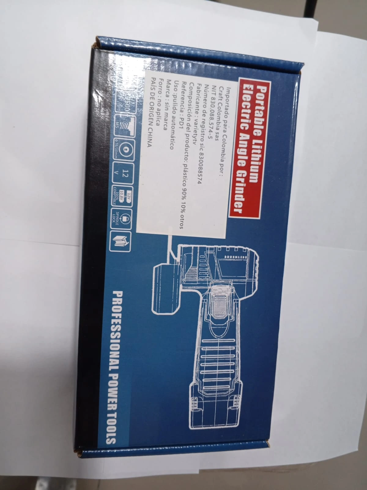 Caja azul de la Mini Pulidora Inalámbrica 12V, mostrando del producto y especificaciones técnicas en etiqueta blanca.