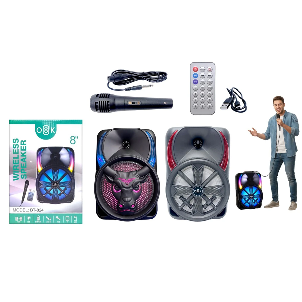 Parlante portátil negro con luces LED, micrófono inalámbrico, control remoto y cable USB. Incluye caja de presentación y figura de hombre cantando.