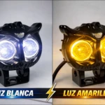 Par exploradora Buo con doble luz LED, mostrando variante blanca y amarilla en vista frontal con montura negra.