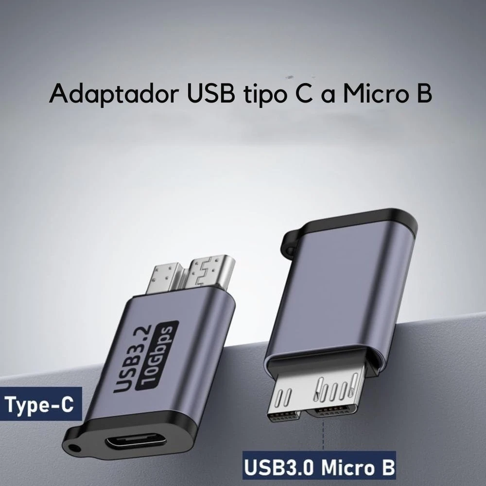Adaptador USB tipo C a Micro B en color gris metálico, mostrando ambos extremos: conector Type-C y puerto Micro B USB 3.0, diseñado para conectar discos duros antiguos a laptops modernas.